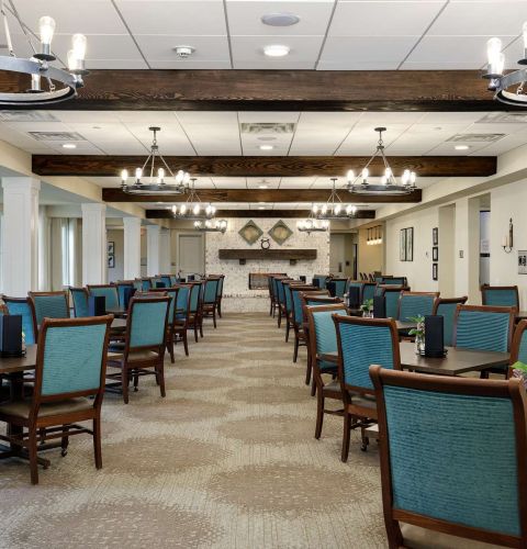 The Claiborne at West Lake assisted living dining area in senior community