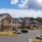 Exterior view of Brickmont at John's Creek senior living community by Claiborne.