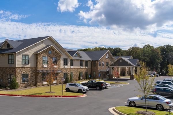 Exterior view of Brickmont at John's Creek senior living community by Claiborne.