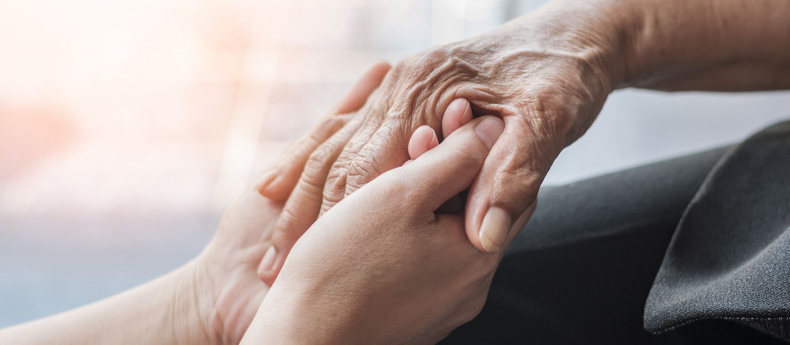 Parkinson disease patient, Alzheimer elderly senior, Arthritis person hand in support of nursing family caregiver care for disability awareness day, National care givers month, ageing society concept