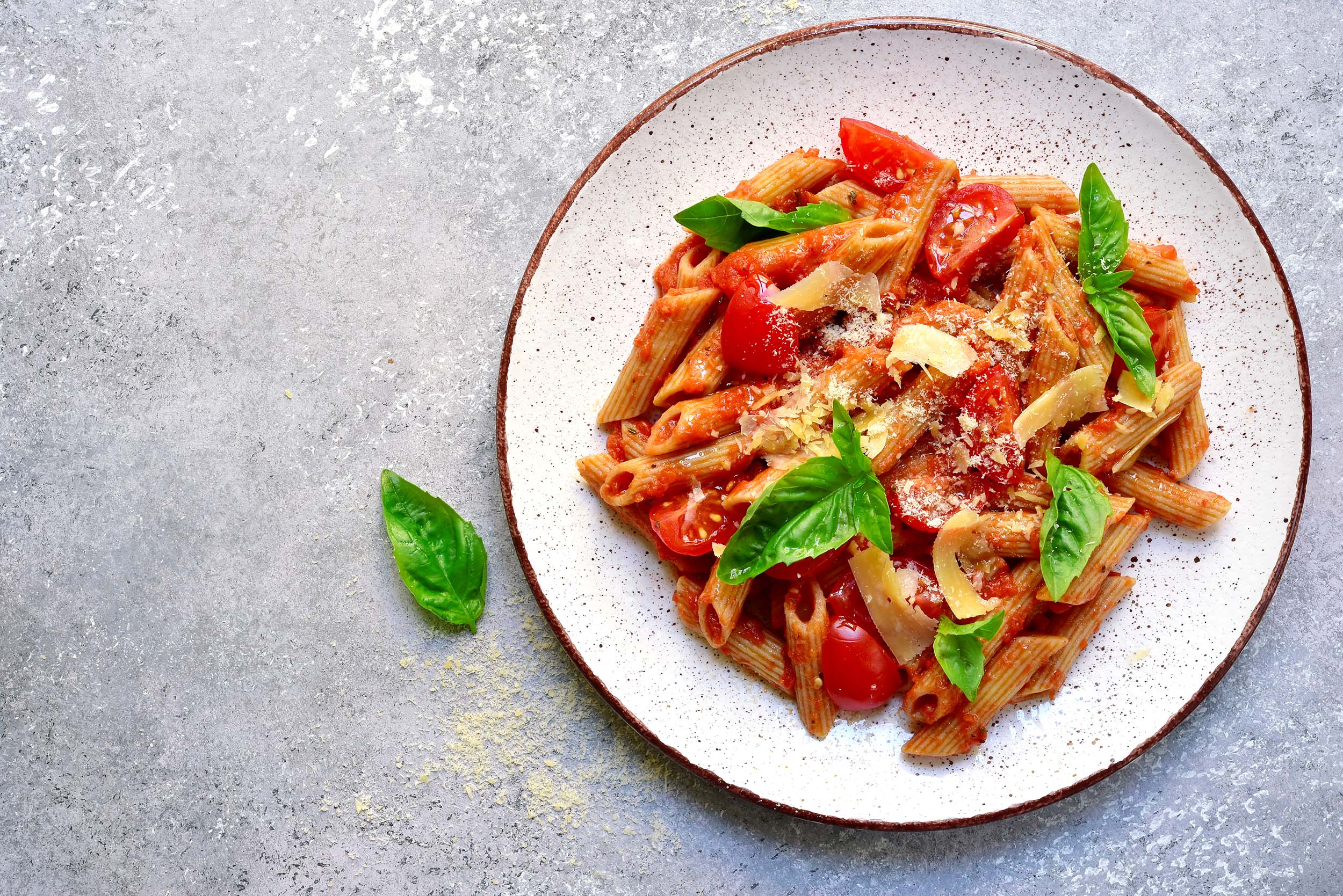 Penne pasta with tomato in red sauce.